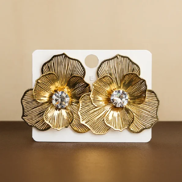 Shiny gold plated diamond studded earrings with sparkling stones – classy festive and wedding wear accessory