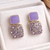 Purple Crystal Square Drop Earrings with Gold Plating and Stone Detailing