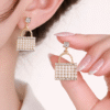 Pearl Handbag Drop Earrings with Gold Plating and Crystal Detailing