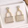 Pearl Handbag Drop Earrings with Gold Plating and Crystal Detailing