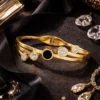 gold plated crystal bracelet for women with black stone designer kada