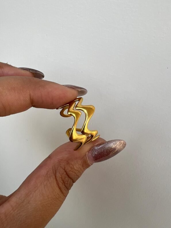 Elegant Gold Wave Statement Ring for Women with Modern Design
