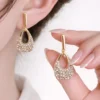 Elegant Gold Pearl Drop Stud Earrings for Women with Pearl Detailing